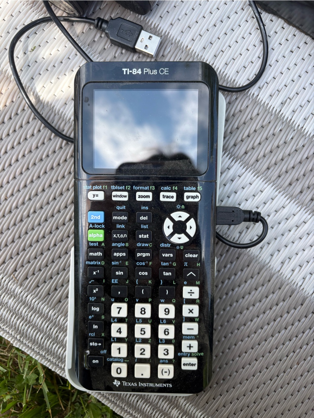 Texas Instruments TI-84 Plus CE Graphing Calculator - Black with White Keys